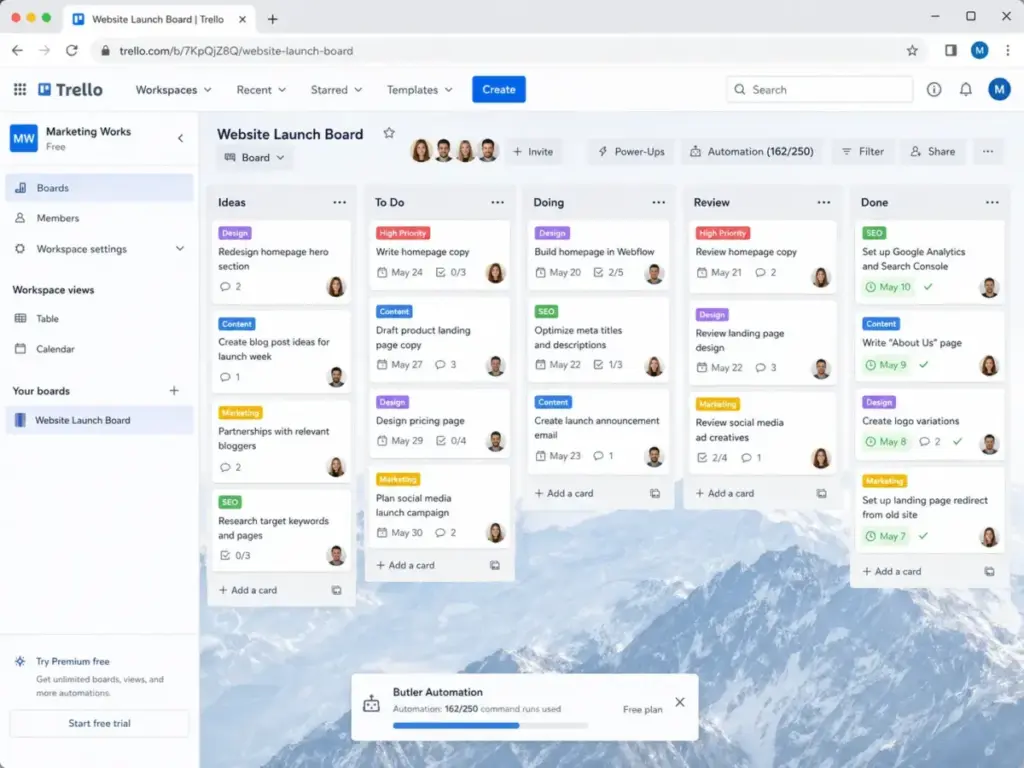 Trello free Kanban board screenshot showing cards across Ideas, To Do, Doing, Review, and Done columns, with colored labels, due dates, member avatars, Power-Ups, and Butler automation usage count.